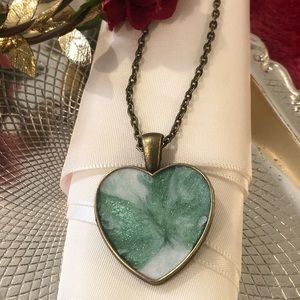 Mesmerizing bronze heart pendant
